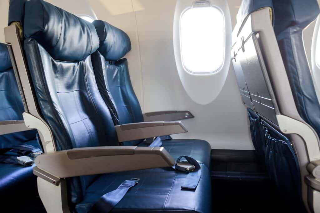 Aircraft Cabin Economy class Left armchairs in a built-in chairs.